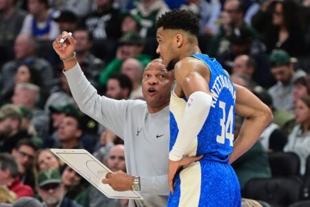 Feb 12, 2024; Milwaukee, Wisconsin, USA; Milwaukee Bucks head coach Doc Rivers draws up a play with forward Giannis Antetokounmpo (34) in the fourth quarter against the Denver Nuggets at Fiserv Forum. Mandatory Credit: Benny Sieu-USA TODAY Sports