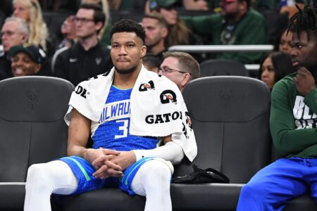 Feb 13, 2024; Milwaukee, Wisconsin, USA; Milwaukee Bucks forward Giannis Antetokounmpo (34) sits on the bench in the second half against the Miami Heat as he watches his team get beat 123-97 at Fiserv Forum. Mandatory Credit: Michael McLoone-USA TODAY Sports