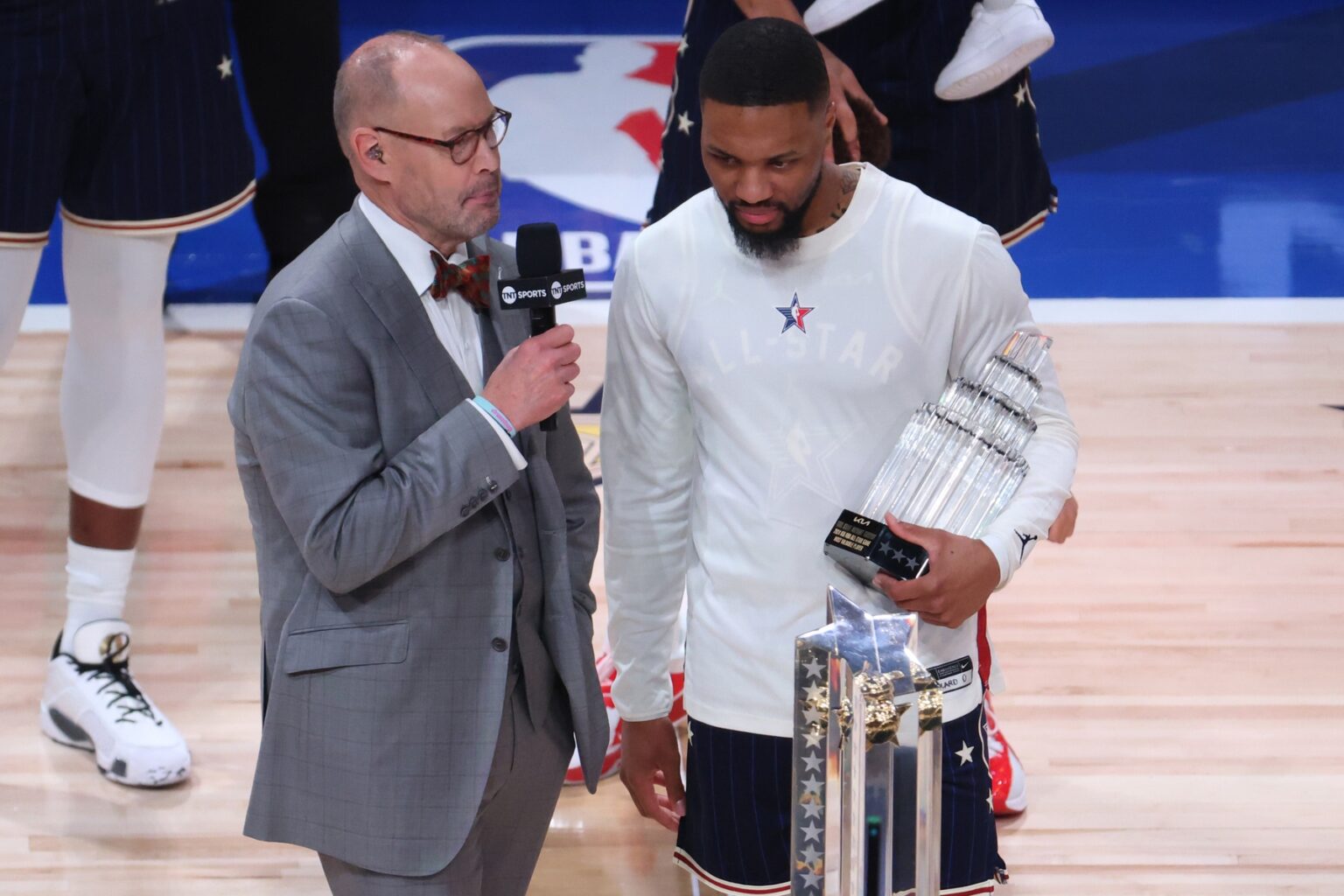Feb 18, 2024; Indianapolis, Indiana, USA; Ernie Johnson interviews MVP Eastern Conference guard Damian Lillard (0) of the Milwaukee Bucks following his team’s victory against the Western Conference All-Stars in the 73rd NBA All Star game at Gainbridge Fieldhouse. Mandatory Credit: Trevor Ruszkowski-USA TODAY Sports