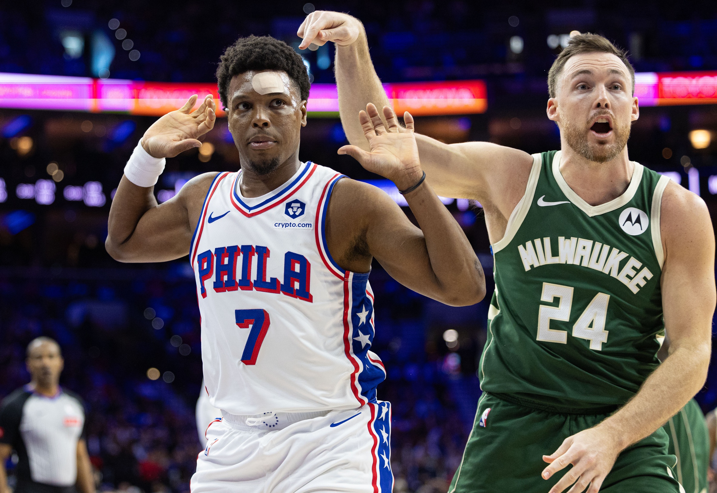 Feb 25, 2024; Philadelphia, Pennsylvania, USA; Philadelphia 76ers guard Kyle Lowry (7) and Milwaukee Bucks guard Pat Connaughton (24) react to an out of bounds ball during the fourth quarter at Wells Fargo Center. Mandatory Credit: Bill Streicher-USA TODAY Sports
