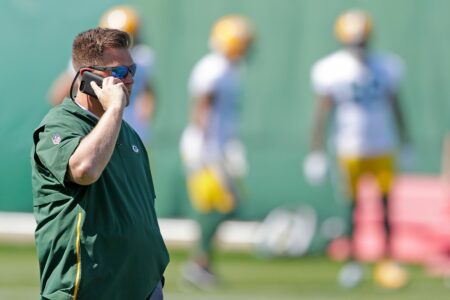 Green Bay Packers GM Brian Gutekunst talks on the phone during practice on Wednesday, September 12, 2018 in Ashwaubenon, Wis. © Adam Wesley/USA TODAY NETWORK-Wis