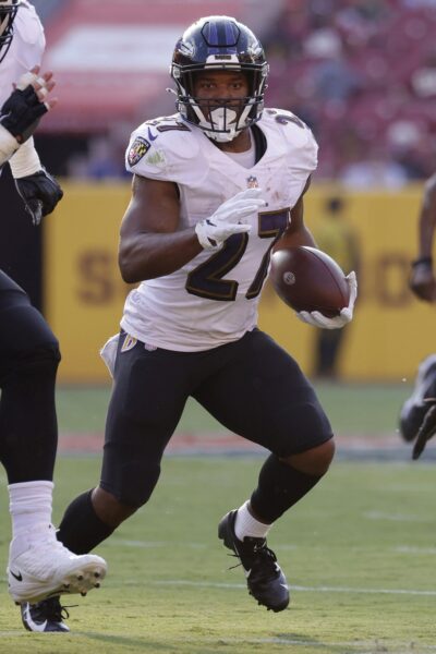 Aug 28, 2021; Landover, Maryland, USA; Baltimore Ravens running back J.K. Dobbins (27) carries the ball against the Washington Football Team at FedExField. Mandatory Credit: Geoff Burke-USA TODAY Sports (Green Bay Packers)