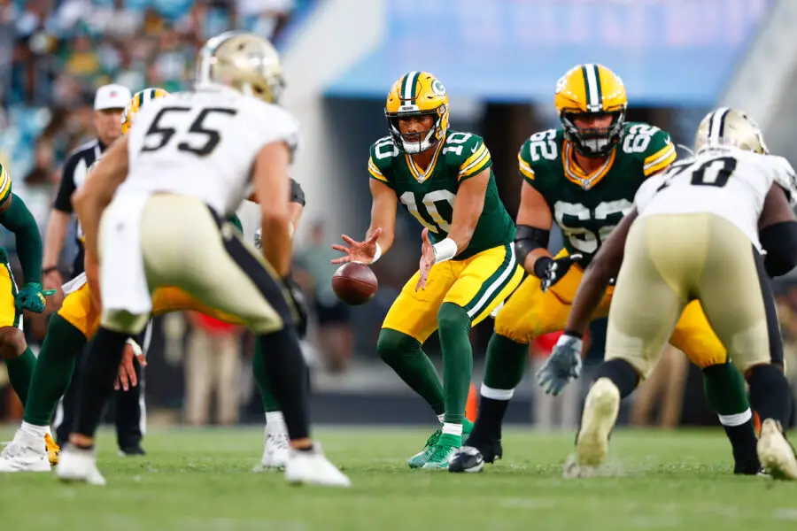 Sep 12, 2021; Jacksonville, Florida, USA; Green Bay Packers quarterback Jordan Love (10) receives the ball in the fourth quarter during a game against the New Orleans Saints at TIAA Bank Field. Mandatory Credit: Nathan Ray Seebeck-USA TODAY Sports