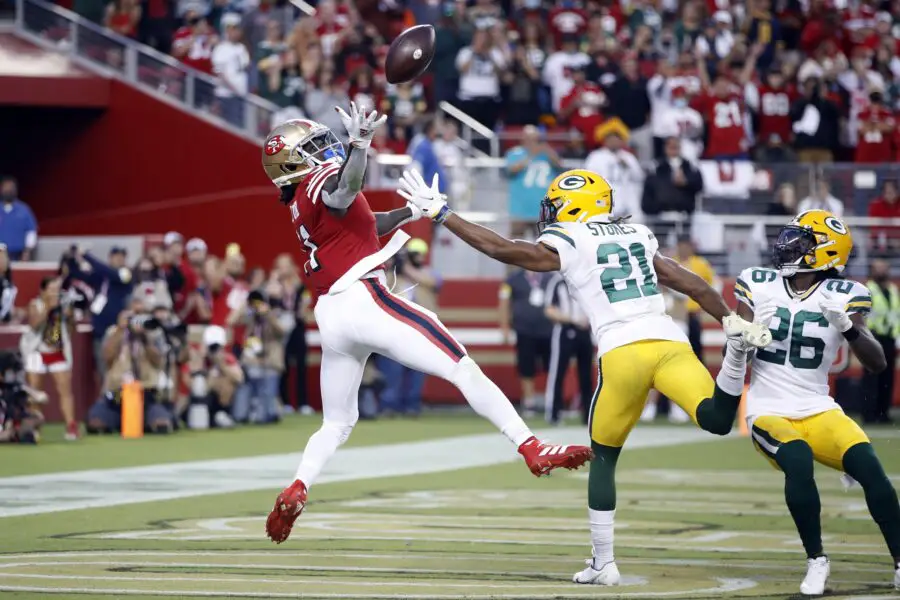 Sep 26, 2021; Santa Clara, California, USA; San Francisco 49ers wide receiver Brandon Aiyuk (11) fails to catch a pass while being defended by Green Bay Packers cornerback Eric Stokes (21) during the second quarter at Levi's Stadium. Mandatory Credit: Darren Yamashita-USA TODAY Sports