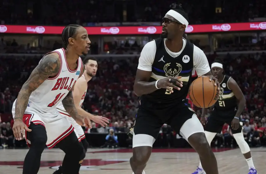 Apr 24, 2022; Chicago, Illinois, USA; Chicago Bulls forward DeMar DeRozan (11) defends Milwaukee Bucks center Bobby Portis (9) in the first half during game four of the first round for the 2022 NBA playoffs at United Center. Mandatory Credit: David Banks-USA TODAY Sports