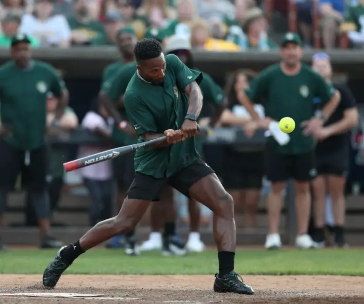 Jarrett Bush lines up a hit during the Donald Driver Charity Softball Game on Sunday, June 4, 2023, at Neuroscience Group Field at Fox Cities Stadium in Appleton ,Wis. Lori Fahrenholz for USA Today Network-Wisconsin