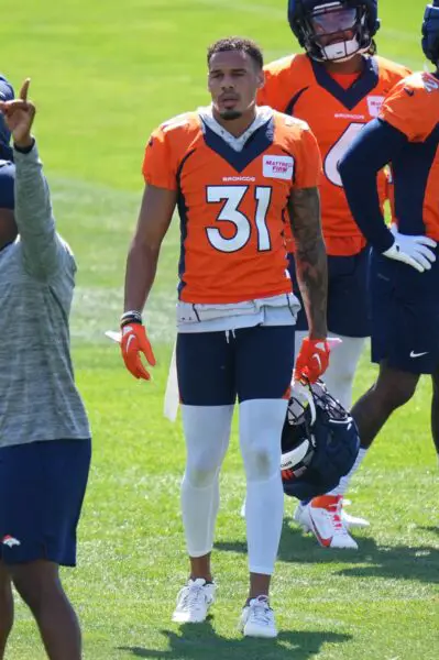 Jul 29, 2023; Englewood, CO, USA; Denver Broncos safety Justin Simmons (31) during training camp drills at the Centura Health Training Center. Mandatory Credit: Ron Chenoy-USA TODAY Sports