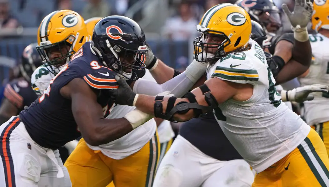 Sep 10, 2023; Chicago, Illinois, USA; Green Bay Packers offensive tackle David Bakhtiari (69) blocks Chicago Bears defensive end Rasheem Green (94) during the fourth quarter of their regular season opening game at Soldier Field. Mandatory Credit: Mark Hoffman-USA TODAY Sports