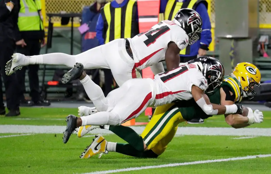 Green Bay Packers tight end Robert Tonyan (85) dives for a touchdown against Atlanta Falcons linebacker Foye Oluokun (54) and Sharrod Neasman (41) during their football game Monday, October 5, 2020, at Lambeau Field in Green Bay, Wis. © Dan Powers/USA TODAY NETWORK-Wisconsin / USA TODAY NETWORK