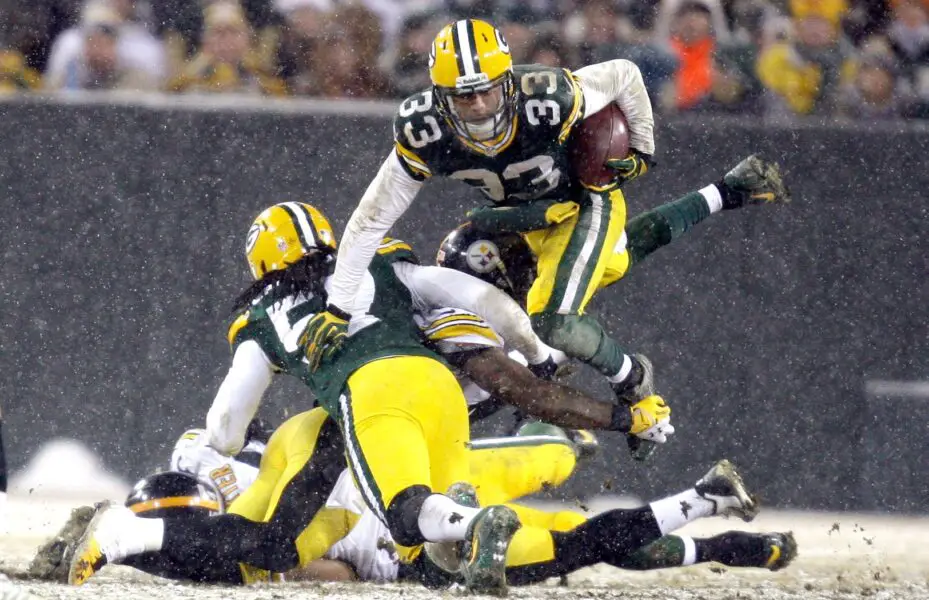 Green Bay Packers cornerback Micah Hyde (33) returns a kick in the 3rd quarter against the Pittsburgh Steelers at Lambeau Field on Sunday, December 22, 2013. © Mike De Sisti / Milwaukee Journal Sentinel / USA TODAY NETWORK