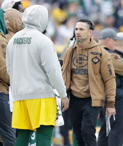 Green Bay Packers head coach Matt LaFleur talks to defensive tackle Kenny Clark after he was injured playing against the Los Angeles Rams during their football game Sunday, November 5, 2023, at Lambeau Field in Green Bay, Wis. Dan Powers/USA TODAY NETWORK-Wisconsin.