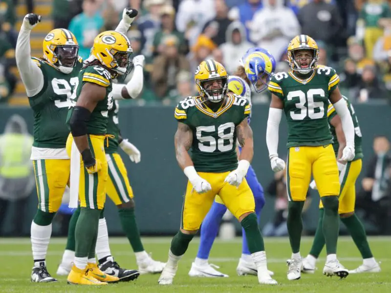Green Bay Packers linebacker Isaiah McDuffie (58) celebrates after tackling Los Angeles Rams cornerback Duke Shelley (26) for a loss during their football game Sunday, November 5, 2023, at Lambeau Field in Green Bay, Wis. © Dan Powers/USA TODAY NETWORK-Wisconsin / USA TODAY NETWORK