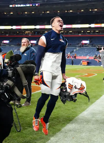 Nov 26, 2023; Denver, Colorado, USA; Denver Broncos safety Justin Simmons (31) celebrates the win over the Cleveland Browns at Empower Field at Mile High. Mandatory Credit: Ron Chenoy-USA TODAY Sports (Green Bay Packers)