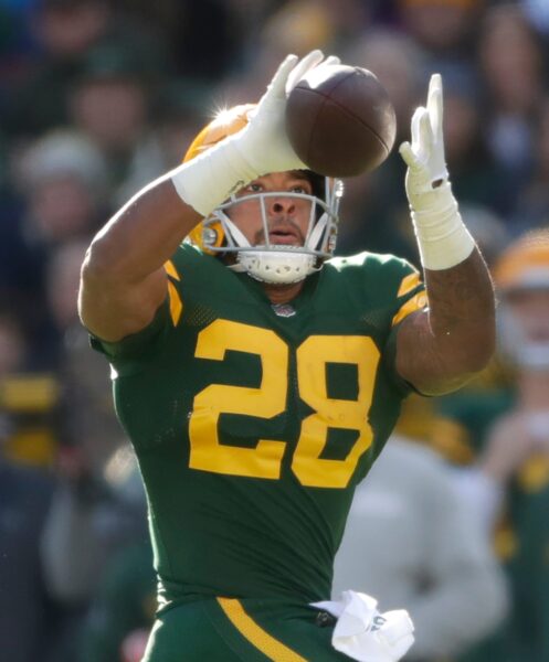 Green Bay Packers running back AJ Dillon (28) against the Los Angeles Chargers during their football game Sunday, November 19, 2023, at Lambeau Field in Green Bay, Wis. The Packers defeated the Chargers 23-20. Wm. Glasheen USA TODAY NETWORK-Wisconsin