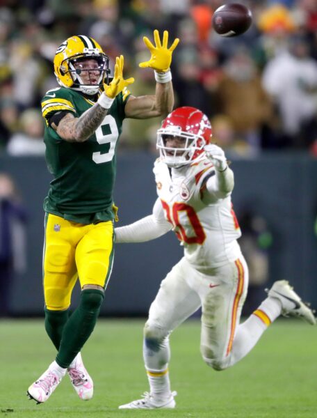 Green Bay Packers wide receiver Christian Watson (9) catches a pass against Kansas City Chiefs safety Justin Reid (20) during their football game Sunday, December 3, 2023, at Lambeau Field in Green Bay, Wis. Wm. Glasheen USA TODAY NETWORK-Wisconsin