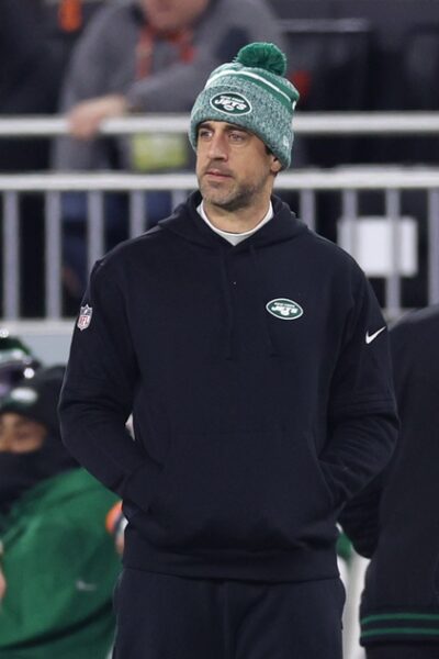 Dec 28, 2023; Cleveland, Ohio, USA; New York Jets quarterback Aaron Rodgers (8) looks on from the sideline during the first half against the Cleveland Browns at Cleveland Browns Stadium. Mandatory Credit: Scott Galvin-USA TODAY Sports