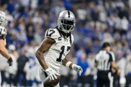 Dec 31, 2023; Indianapolis, Indiana, USA; Las Vegas Raiders wide receiver Davante Adams (17) celebrates his touchdown in the second half against the Indianapolis Colts at Lucas Oil Stadium. Mandatory Credit: Trevor Ruszkowski-USA TODAY Sports