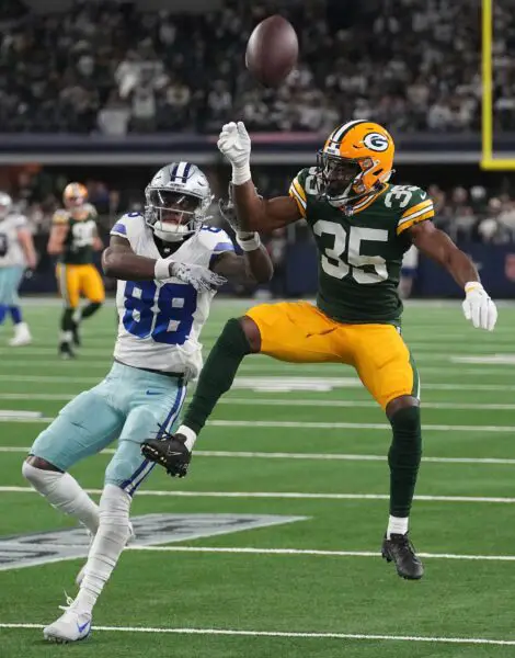 Jan 14, 2024; Arlington, Texas, USA; Dallas Cowboys wide receiver CeeDee Lamb (88) is unable to make a catch while being covered by Green Bay Packers cornerback Corey Ballentine (35) during the fourth quarter in a 2024 NFC wild card game at AT&T Stadium. Mandatory Credit: Mark Hoffman-USA TODAY Sports