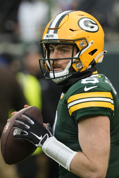 Jan 7, 2024; Green Bay, Wisconsin, USA; Green Bay Packers quarterback Sean Clifford (8) during warmups prior to the game against the Chicago Bears at Lambeau Field. Mandatory Credit: Jeff Hanisch-USA TODAY Sports