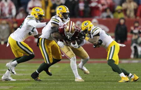 Jan 20, 2024; Santa Clara, CA, USA; San Francisco 49ers wide receiver Deebo Samuel (19) gains yardage on a reception against Green Bay Packers linebacker De'Vondre Campbell (59), linebacker Quay Walker (7) and cornerback Jaire Alexander (23) in a 2024 NFC divisional round game at Levi's Stadium. Mandatory Credit: Dan Powers-USA TODAY Sports