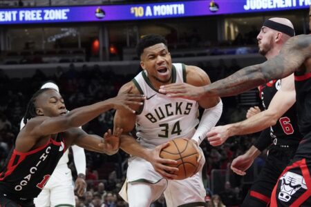 Mar 1, 2024; Chicago, Illinois, USA; Chicago Bulls guard Alex Caruso (6) defends Milwaukee Bucks forward Giannis Antetokounmpo (34) during the second half at United Center. Mandatory Credit: David Banks-USA TODAY Sports