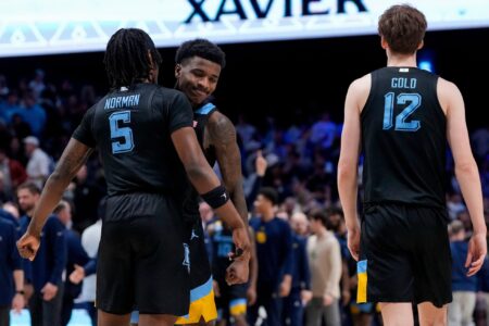The Marquette Golden Eagles celebrate a win in the second half of the NCAA Big East basketball game between the Xavier Musketeers and the Marquette Golden Eagles at Cintas Center in Cincinnati on Saturday, March 9, 2024. Xavier lost its final game of the regular season, 86-80.