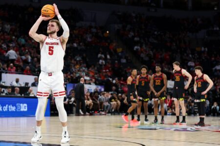 Mar 14, 2024; Minneapolis, MN, USA; Wisconsin Badgers forward Tyler Wahl (5) shoots a free throw after drawing a technical foul from Maryland Terrapins forward Julian Reese (10) during the second half at Target Center. Mandatory Credit: Matt Krohn-USA TODAY Sports