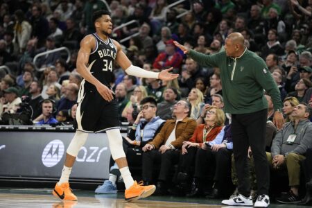 Mar 14, 2024; Milwaukee, Wisconsin, USA; Milwaukee Bucks forward Giannis Antetokounmpo (34) is greeted by head coach Doc Rivers during the second quarter against the Philadelphia 76ers at Fiserv Forum. Mandatory Credit: Jeff Hanisch-USA TODAY Sports