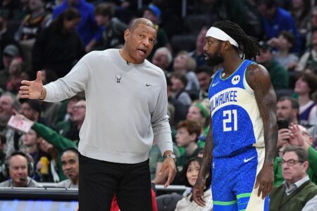 Mar 17, 2024; Milwaukee, Wisconsin, USA; Milwaukee Bucks head coach Doc Rivers talks with Milwaukee Bucks guard Patrick Beverley (21) during a time out at Fiserv Forum. Mandatory Credit: Michael McLoone-USA TODAY Sports
