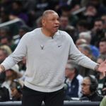 Mar 26, 2024; Milwaukee, Wisconsin, USA; Milwaukee Bucks coach Doc Rivers questions a call against Los Angeles Lakers at Fiserv Forum. Mandatory Credit: Michael McLoone-USA TODAY Sports