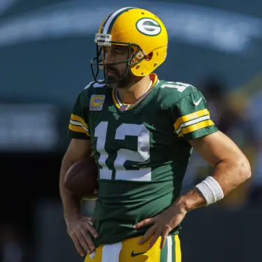 Oct 2, 2022; Green Bay, Wisconsin, USA; Green Bay Packers quarterback Aaron Rodgers (12) during warmups prior to the game against the New England Patriots at Lambeau Field. Mandatory Credit: Jeff Hanisch-USA TODAY Sports