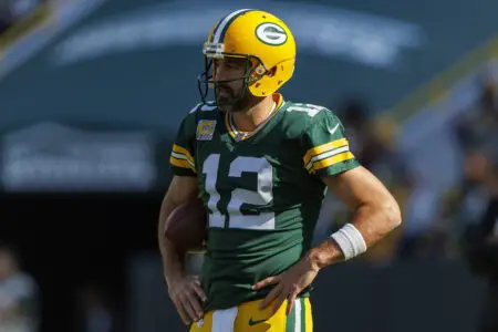 Oct 2, 2022; Green Bay, Wisconsin, USA; Green Bay Packers quarterback Aaron Rodgers (12) during warmups prior to the game against the New England Patriots at Lambeau Field. Mandatory Credit: Jeff Hanisch-USA TODAY Sports