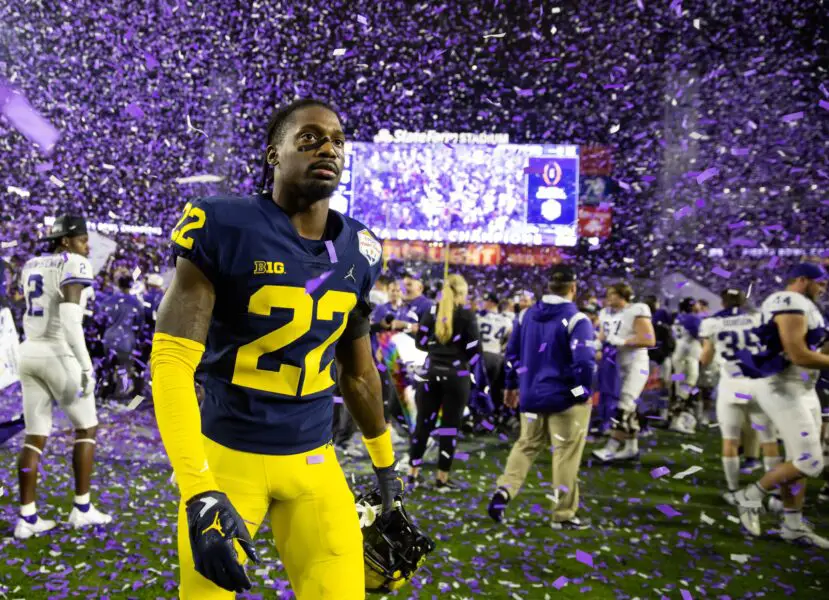 Dec 31, 2022; Glendale, Arizona, USA; Confetti falls as Michigan Wolverines defensive back Gemon Green (22) reacts as he walks off the field after losing to the TCU Horned Frogs during the 2022 Fiesta Bowl at State Farm Stadium. Mandatory Credit: Mark J. Rebilas-USA TODAY Sports (Green Bay Packers)