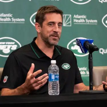 Apr 26, 2023; Florham Park, NJ, USA; New York Jets quarterback Aaron Rodgers (8) addresses the media during the introductory press conference at Atlantic Health Jets Training Center. Mandatory Credit: Tom Horak-USA TODAY Sports