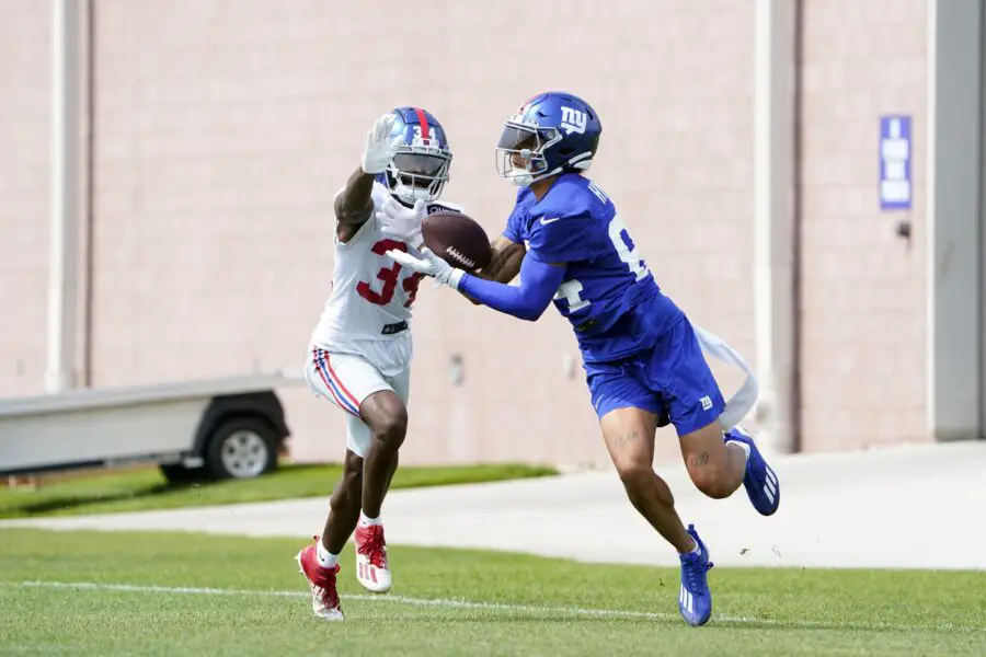 Jul 27, 2023; East Rutherford, NJ, USA; New York Giants rookie cornerback Gemon Green, left, puts pressure on rookie wide receiver Jalin Hyatt, right, on day two of training camp at the Quest Diagnostics Training Facility. Mandatory Credit: Danielle Parhizkaran-USA TODAY Sports (Green Bay Packers)