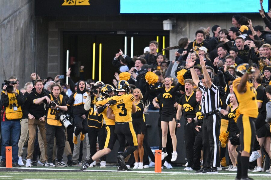 Oct 21, 2023; Iowa City, Iowa, USA; A referee signals for a touchdown on a late punt return by Iowa Hawkeyes defensive back Cooper DeJean (3) as wide receiver Jacob Bostick (7) reacts against the Minnesota Golden Gophers during the fourth quarter at Kinnick Stadium. The touchdown was called back after a replay review due to a fair catch signal by DeJean. Mandatory Credit: Jeffrey Becker-USA TODAY Sports (Green Bay Packers)