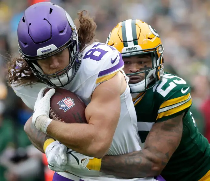 Green Bay Packers cornerback Keisean Nixon (25) tackles Minnesota Vikings tight end T.J. Hockenson (87) during their football game Sunday, October 29, 2023, at Lambeau Field in Green Bay, Wis. Minnesota defeated Green Bay 24-10. Wm. Glasheen USA TODAY NETWORK-Wisconsin
