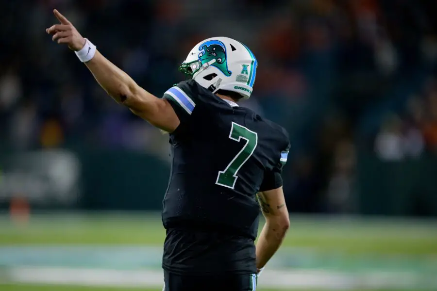 Nov 24, 2023; New Orleans, Louisiana, USA; Tulane Green Wave quarterback Michael Pratt (7) points to the scoreboard after a touchdown against the UTSA Roadrunners during the second half at Yulman Stadium. Mandatory Credit: Matthew Hinton-USA TODAY Sports