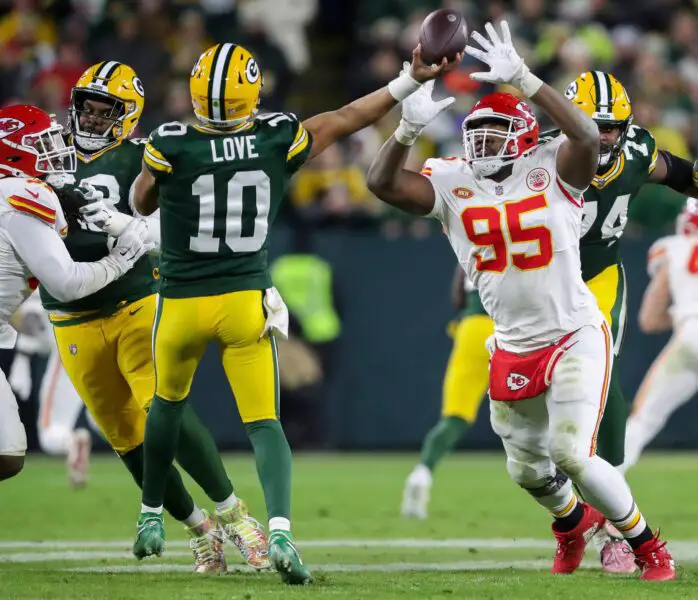 Kansas City Chiefs defensive tackle Chris Jones (95) pressures Green Bay Packers quarterback Jordan Love (10) as Love passes the ball on Sunday, December 3, 2023, at Lambeau Field in Green Bay, Wis. The Packers won the game, 27-19. Tork Mason/USA TODAY NETWORK-Wisconsin