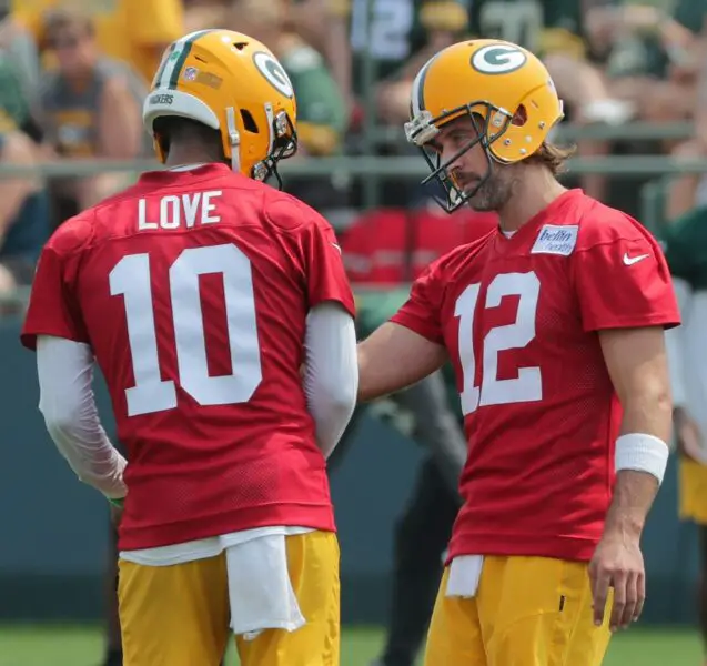 Green Bay Packers quarterback Aaron Rodgers (12) talks with quarterback Jordan Love (10) during the first day of training camp on July 28, 2021 in Green Bay, Wis. © Mark Hoffman / Milwaukee Journal Sentinel / USA TODAY NETWORK