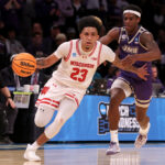 Mar 22, 2024; Brooklyn, NY, USA; Wisconsin Badgers guard Chucky Hepburn (23) drives to the basket against James Madison Dukes guard Xavier Brown (0) during the second half at Barclays Center. Mandatory Credit: Brad Penner-USA TODAY Sports
