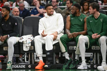 Apr 10, 2024; Milwaukee, Wisconsin, USA; Milwaukee Bucks forward Giannis Antetokounmpo (34) sits on the bench with a calf injury in the second quarter against the Orlando Magic at Fiserv Forum. Mandatory Credit: Benny Sieu-USA TODAY Sports