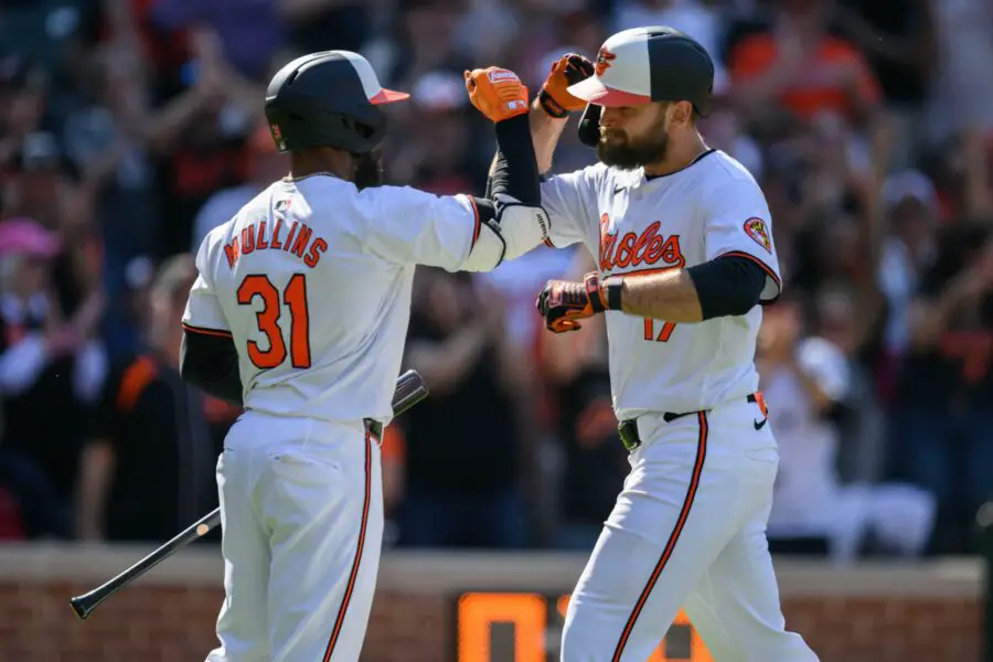 Apr 14, 2024; Baltimore, Maryland, USA; Baltimore Orioles outfielder Colton Cowser (17) celebrates with outfielder Cedric Mullins (31) after hitting a home run during the eighth inning against the Milwaukee Brewers at Oriole Park at Camden Yards. Mandatory Credit: Reggie Hildred-USA TODAY Sports