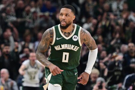 Apr 21, 2024; Milwaukee, Wisconsin, USA; Milwaukee Bucks guard Damian Lillard (0) reacts after scoring a basket in the in the second quarter against the Indiana Pacers during game one of the first round for the 2024 NBA playoffs at Fiserv Forum. Mandatory Credit: Benny Sieu-USA TODAY Sports