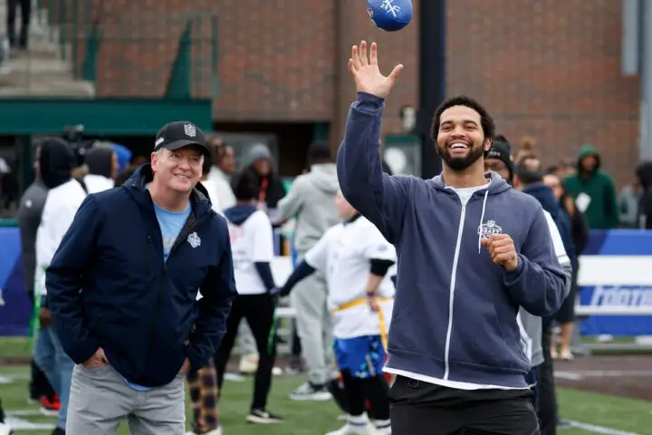 NFL commissioner Roger Goodell watches USC quarterback Caleb Williams, who is expected to be the first pick in this year's NFL draft, catch the football while throwing to Detroit-area Special Olympics athletes during the NFL Play Football Prospect Clinic with Special Olympics athletes and 13 of the 2024 NFL draft prospects at the Corner Ballpark in Detroit on Wednesday, April 24, 2024.