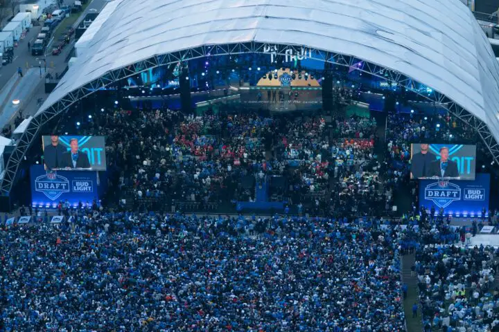 NFL Commissioner Roger Goodell brings up local music artist Eminem and some Detroit Lions on the main theater stage on Thursday, April 25, 2024 for the first day of the NFL Draft in Detroit.© Detroit Free Press-USA TODAY Sports