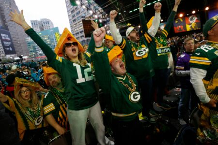 Green Bay Packers fans yell as their pick is made in the second round of 2024 NFL draft in Detroit on Friday, April 26, 2024. © Eric Seals / USA TODAY NETWORK