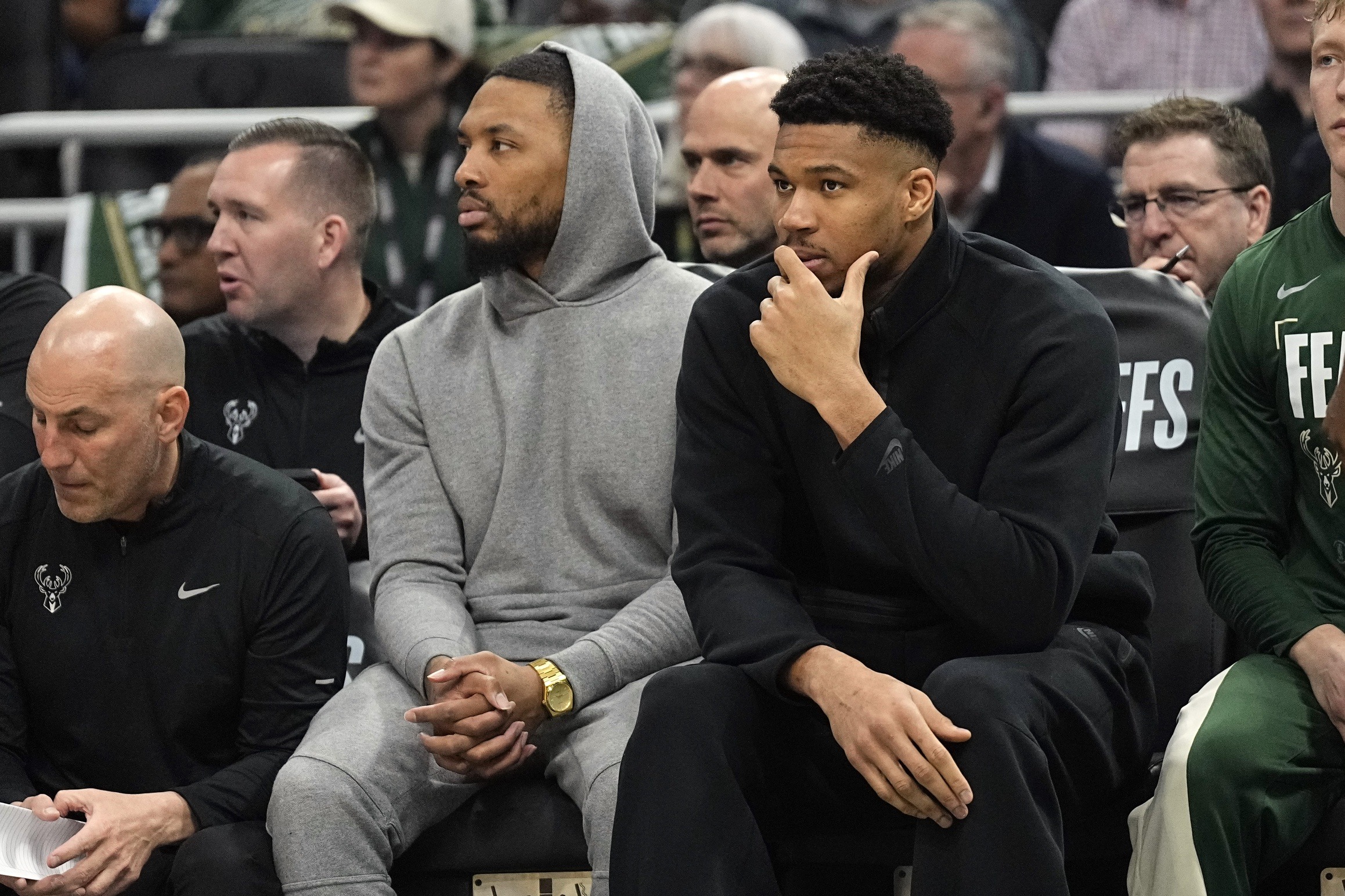 Apr 30, 2024; Milwaukee, Wisconsin, USA; Milwaukee Bucks guard Damian Lillard and forward Giannis Antetokounmpo watch from the bench during the first quarter during game five of the first round for the 2024 NBA playoffs against the Indiana Pacers at Fiserv Forum. Mandatory Credit: Jeff Hanisch-USA TODAY Sports