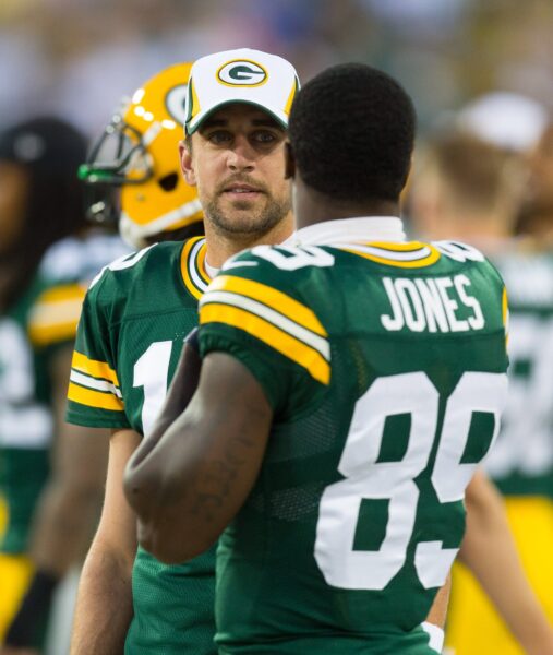 Aug 9, 2013; Green Bay, WI, USA; Green Bay Packers quarterback Aaron Rodgers (12) talks with wide receiver James Jones (89) during the game against the Arizona Cardinals at Lambeau Field. The Cardinals won 17-0. Mandatory Credit: Jeff Hanisch-USA TODAY Sports