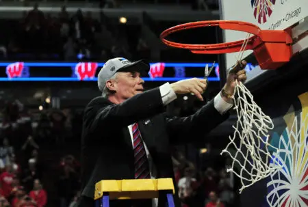 Mar 15, 2015; Chicago, IL, USA; Wisconsin Badgers head coach Bo Ryan cuts down the net after the championship game of the Big Ten Tournament against the Michigan State Spartans at United Center. Mandatory Credit: David Banks-USA TODAY Sports